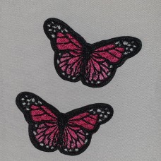 Applicatie mini vlinder zwart fuchsia