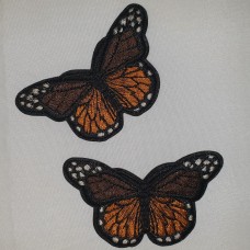 Applicatie vlinder zwart bruin