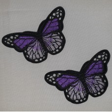 Applicatie vlinder zwart paars