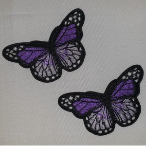 Applicatie vlinder zwart paars