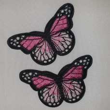 Applicatie vlinder zwart roze